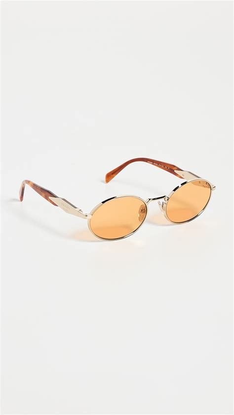 Prada 0PR 65ZS Sunglasses .